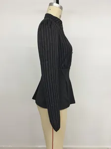 Side view of a pinstriped long-sleeved blouse with a spliced peplum waist design.