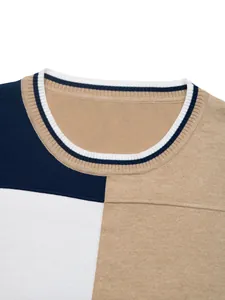 Detailed view of color-block knit sweater neckline featuring striped ribbing texture