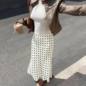 Elegant high-waisted white midi mermaid skirt with black polka dots for women