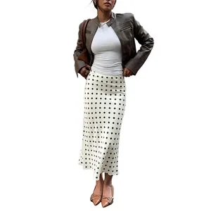 Elegant high-waisted white and black polka dot fishtail midi skirt for stylish women