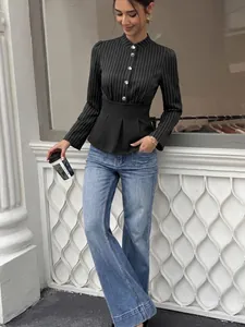Full-length view of elegant striped long-sleeve blouse with a cinched waist peplum detail