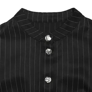 Macro view showing unique silver buttons on a black pinstriped lady's commuter shirt