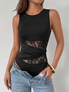 Detail of black sleeveless bodysuit featuring elegant lace cutouts and a stylish twist waist.