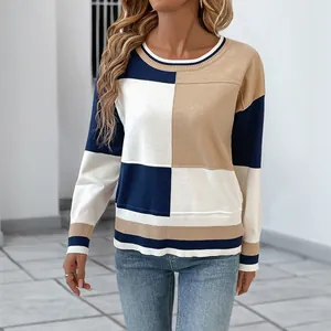 Casual crew neck knitted sweater featuring navy blue and beige geometric color-block design