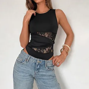 Chic black sleeveless bodysuit with lace patchwork and knot detail shown on model