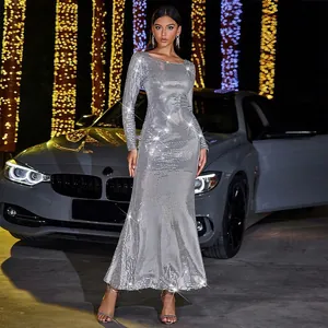 Elegante vestido de noche largo con lentejuelas plateadas, manga larga y corte sirena