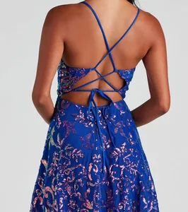 Back detail of shimmering royal blue sequin cocktail mini dress with cross straps
