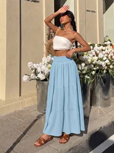Elegant light blue tiered A-line maxi skirt with high elastic waist for summer chic style