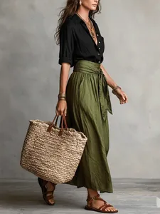 Bohemian summer outfit with black shirt and olive green maxi skirt set