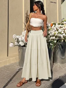 Elegant high-waist beige tiered maxi skirt with smocked elastic waistband detail