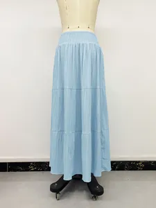 Detailed view of light blue tiered A-line maxi skirt featuring an elastic high waist
