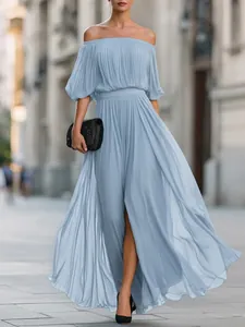 Elegant light blue off-the-shoulder pleated chiffon maxi dress with a side slit detail.