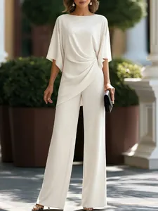 Elegante set due pezzi crema con top drappeggiato e pantaloni a gamba larga a vita alta
