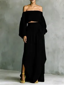 Elegant black off-shoulder crop top and irregular maxi skirt two-piece set for women