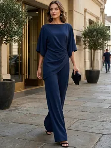 Elegante set blu scuro con top drappeggiato e pantaloni a gamba larga
