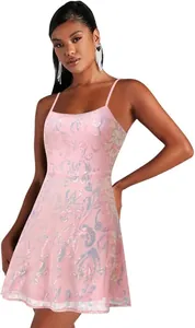 Detailed view of an elegant pink sequin mini dress with spaghetti straps for cocktail parties.