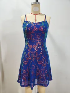 Close-up detail of a blue mini cocktail dress featuring colorful shimmering sequins