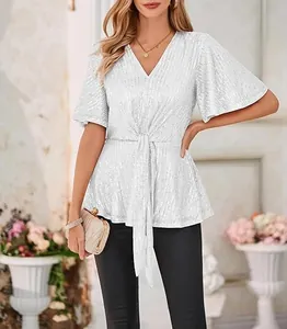Detailed view of women's silver sequin V-neck top with bell sleeves and tie waist.