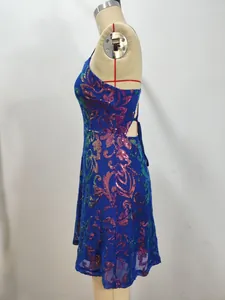 Detailed side profile of a sparkling blue sequined cocktail mini dress on a mannequin form