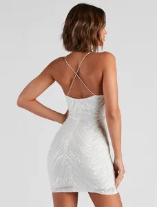 Detailed back view of a white sequin bodycon mini dress with elegant cross-back straps