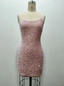 Detailed view of a shiny pink sequined bodycon mini dress featuring thin shoulder straps.