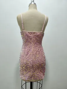 Detailed back view of pink sequin velvet bodycon mini dress with spaghetti straps