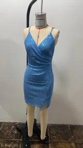 Close-up detail of a light blue sequined camisole mini dress on a tailor mannequin