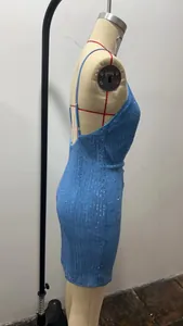 Side view of a sexy blue sequined bodycon mini dress with thin straps on a mannequin