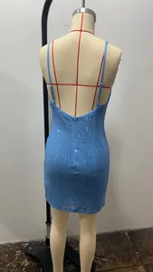 Back view detail of light blue sequined bodycon dress with spaghetti straps.