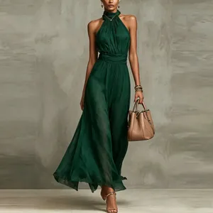 Detailed view of elegant emerald green halter neck pleated chiffon maxi dress fashion