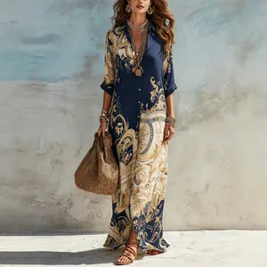 Elegant bohemian navy blue maxi dress featuring vintage gold digital print and a V-neckline