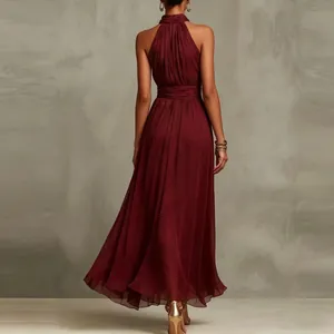 Back view of burgundy halter neck maxi dress with elegant pleats and chiffon fabric