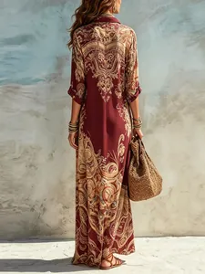 Detailed back view of a vintage ethnic print maxi dress with intricate patterns in maroon