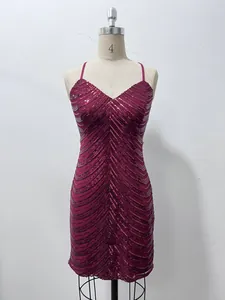 Front view of a wine red sequined bodycon slip dress displayed on a white mannequin.