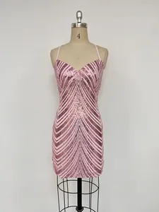 Detailed front view of pink sequined bodycon mini dress featuring a chevron pattern