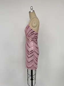 Side view of pink sequined bodycon cocktail dress featuring a chic chevron stripe pattern.