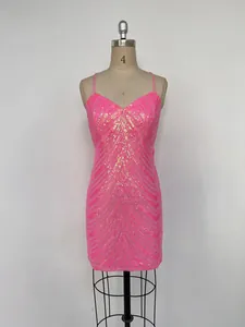 Detailed macro view of a vibrant neon pink sequin bodycon mini dress displayed on a mannequin