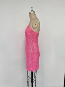 Side view detail of pink sequin bodycon dress showing glittering chevron pattern on mannequin