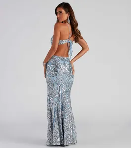 Detailed view of the back cut-out and elegant lace-up sequins light blue evening gown