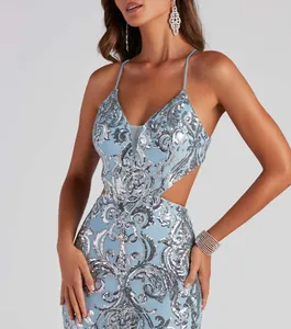 Close-up of elegant light blue V-neck sequined evening dress with side cutouts