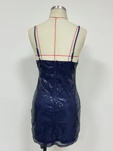 Close-up of the back zipper and sequin texture on navy blue bodycon dress displayed on mannequin