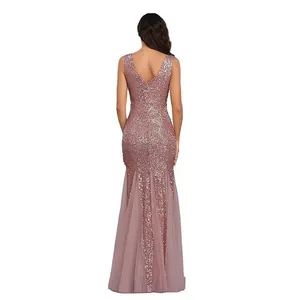 Back view of elegant rose gold sequin mermaid evening banquet dress with mesh detail