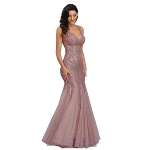 Elegant sequin mermaid evening gown with shimmering sequins and flowing tulle skirt detail