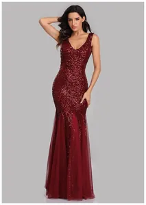 Elegant floor-length red sequin mermaid evening gown featuring a classic V-neck and mesh hem