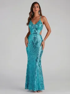 Detailed view of an elegant aqua sequined evening gown with intricate patterns for party