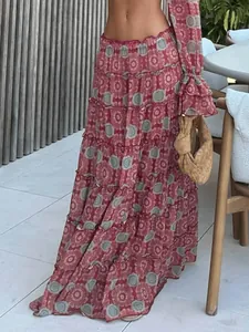 Bohemian style printed tiered maxi skirt and matching long sleeve top set for vacation wear.