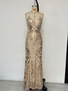 Full-length view of a champagne gold sequined evening gown with elegant V-neckline