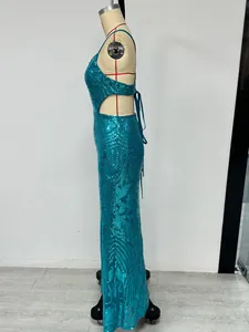 Side view of elegant teal sequin evening gown with open back and cut-out details
