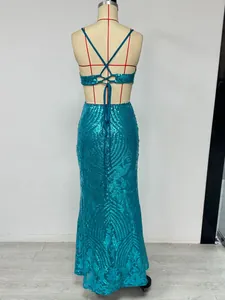 Close-up back view detail of teal sequin mermaid evening gown with criss-cross straps