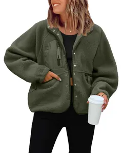 Detailed view of women's olive green fuzzy fleece jacket featuring silver snap buttons